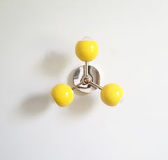 Yellow and chrome ceiling pendant chandelier modern mid century globe eyeball shade childrens lighting