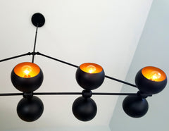 Mid century style linear chandelier for oversized dining rooms