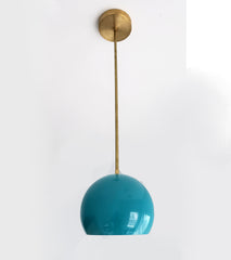 Brass and Teal midcentury modern inspired kitchen pendant lighting with a large globe shade