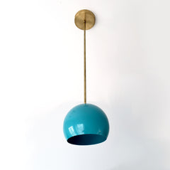 Brass and Teal midcentury modern inspired kitchen pendant lighting with a large globe shade