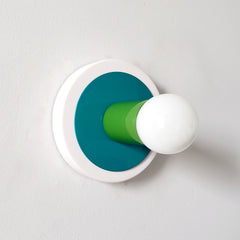 midcentury art inspired multicolored green and teal wall sconce of flush mount ceiling light fixture by Sazerac Stitches
