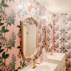 pink and green botanical bathroom with double vanity
