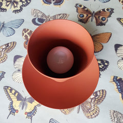 terra cotta monochromatic wall sconce or single flushmount light