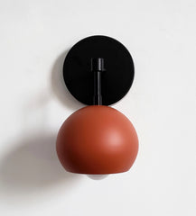 terra cotta and black modern single eyeball shade wall sconce modern lighting