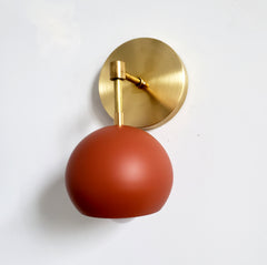 terra cotta and brass single eyeball shade wall sconce modern lighting