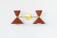 terra cotta brown and brass two light bathroom wall sconce with mid century modern cone shades