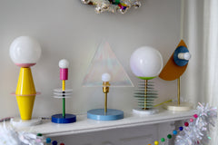 Mint and chartreuse unique stacked disc lamp with marble base and neon cord.  Unique handmade lamp designed and made in New Orleans by Sazerac Stitches.  Sculptural lamp design that can be customized into any colors. Modern geometric style lamp fixture that looks different based on the angle of viewing.  Weird unique modern and colorful table lamp.