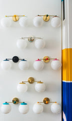 wall of vanity sconces display