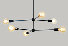 black annunciation chandelier by sazerac stitches sputnik midcentury inspired lighting