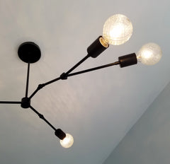 matte black Black modern asymmetric chandelier lighting mid century organic design home renovation dining room