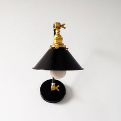black and brass adjustable wall mount sconce for kitchen open shelving bedside reading or angled task lamp