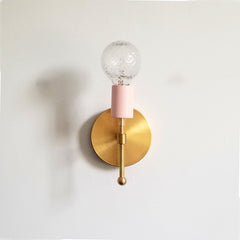 light pink and brass wall sconce modern lighting fixture