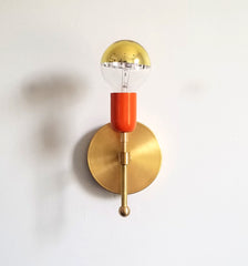 brass and orange wall sconce modern lighting bathroom wall fixture