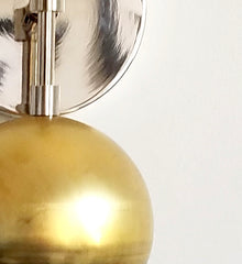 Double Loa Sconce in Raw Brass