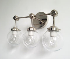 chrome three-light wall sconce