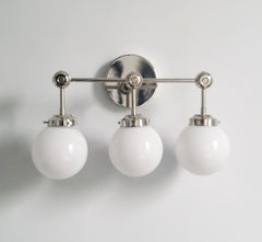 Chrome and white three light wall sconce bathroom lighting