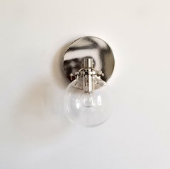 chrome and clear globe wall sconce bathroom lighting