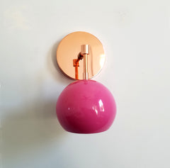 bright pink and copper modern eyeball shade wall sconce nursery decor mid century modern inspired