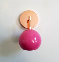 bright pink and copper modern eyeball shade wall sconce nursery decor mid century modern inspired