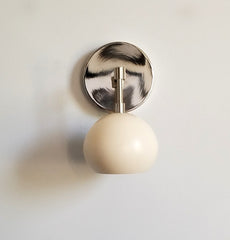 Cream and Chrome eyeball shade wall sconce