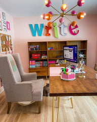 Colorful midcentury modern office makeover with orange and pink sputnik style chandelier