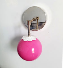 bright pink daisy sconce by Sazerac stitches with chrome hardware modern lighting