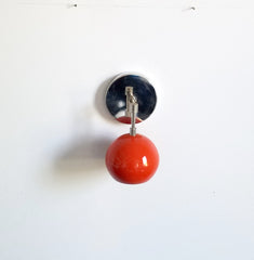 chrome and orange single wall light sconce