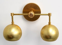 Double Loa Sconce in Raw Brass