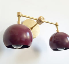 brass and blackberry two-light midcentury modern inspired lighting