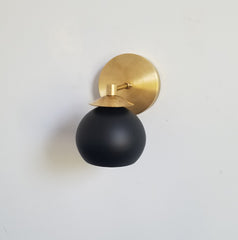 black and brass bathroom lighting midcentury modern matte black wall sconce