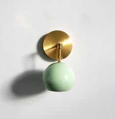 brass and mint single light wall sconce accent lighting midcentury inspired eyeball globe shade
