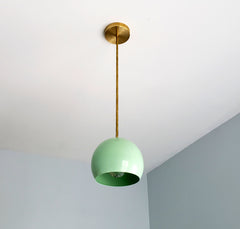 Large Globe Pendant with a Mint green shade and brass hardware by Sazerac Stitches