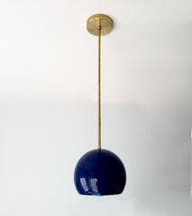navy and brass modern globe pendant mid century modern style