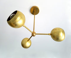 brass orb chandelier eyeball shade mid century modern ceiling lighting