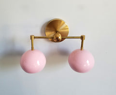 pink and brass two light mid century style sconce nursery decor lighting