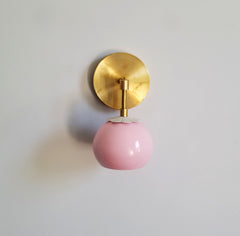 pink and brass daisy loa single sconce bathroom fixture