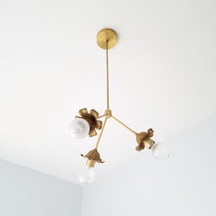 french inspired chandelier with floral shades brass gold lighting