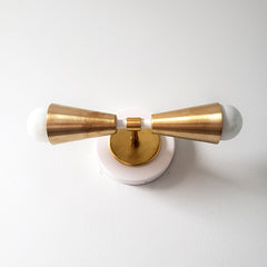 white and brass art deco inspired 2 light wall lighting for bathrooms or accent lighting