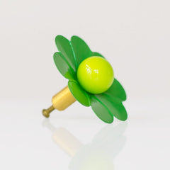 green and neon chartreuse cabinetry knob or furniture knob.  Shaped like a daisy drawer pull