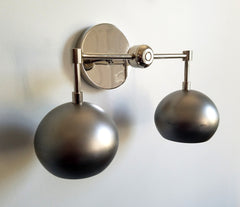 chrome and steel bathroom light fixture