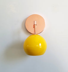 yellow and copper eyeball shade wall sconce nursery decor vanity lighting mid century modern inspired powdercoated yellow wall lighting