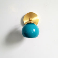 brass and turquoise midcentury lighting modern home