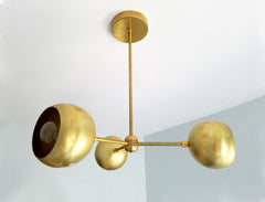 brass orb chandelier eyeball shade mid century modern ceiling lighting
