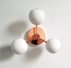 copper and white modern wall sconce chandelier lighting fixture midcentury modern scandinavian design white copper