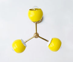 yellow and brass flower chandelier children's bedroom