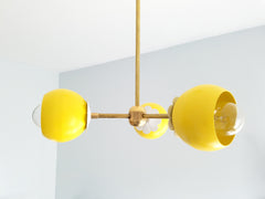 yellow and brass flower chandelier childrens bedroom