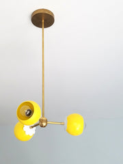 yellow and brass flower chandelier children's bedroom