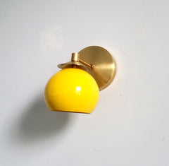 Brass and bright yellow midcentury modern inspired MCM design lighting wall sconce