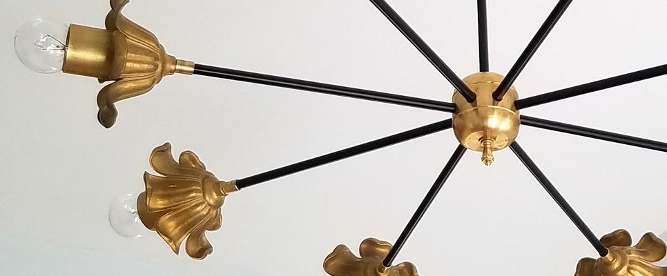 Octavia floral chandelier in brass and black modern lighting art deco design