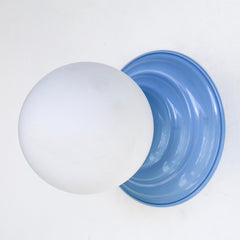 Pastel Blue and white glass small bathroom wall sconce or ceiling light fixture that is great for colorful spaces, adds a pop of color to neutral spaces, and is fun in kids spaces